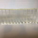 Twelve old lucite knife holders