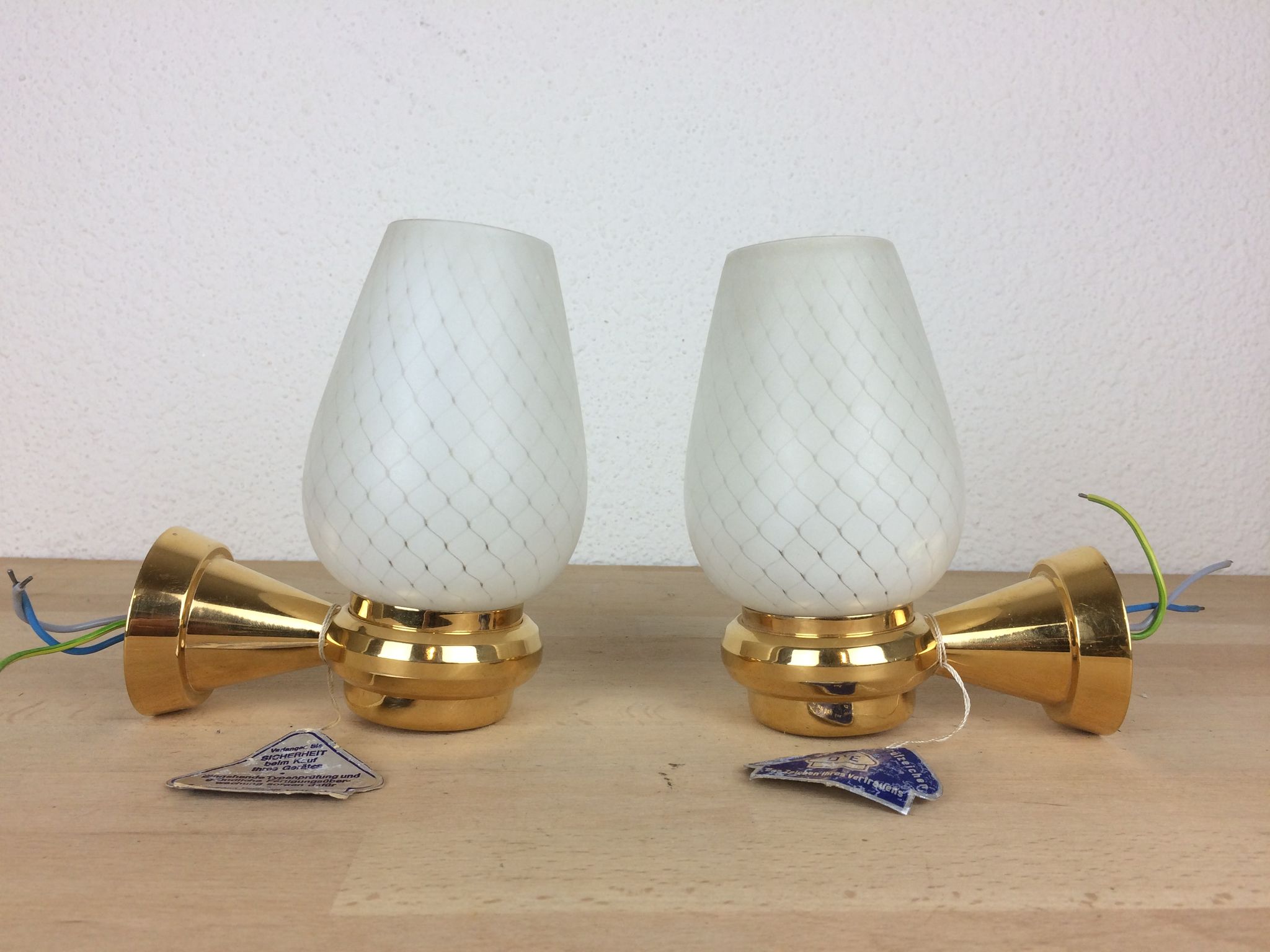 Pair of solid brass and white opaline wall lamps