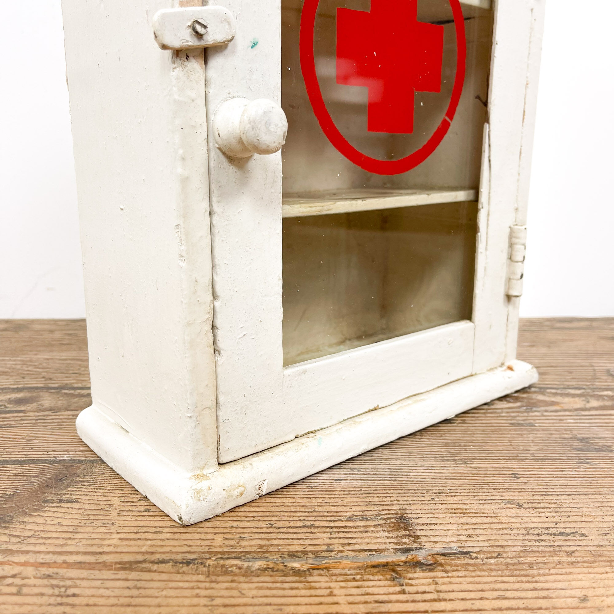 Vintage medicine cabinet red cross glass door