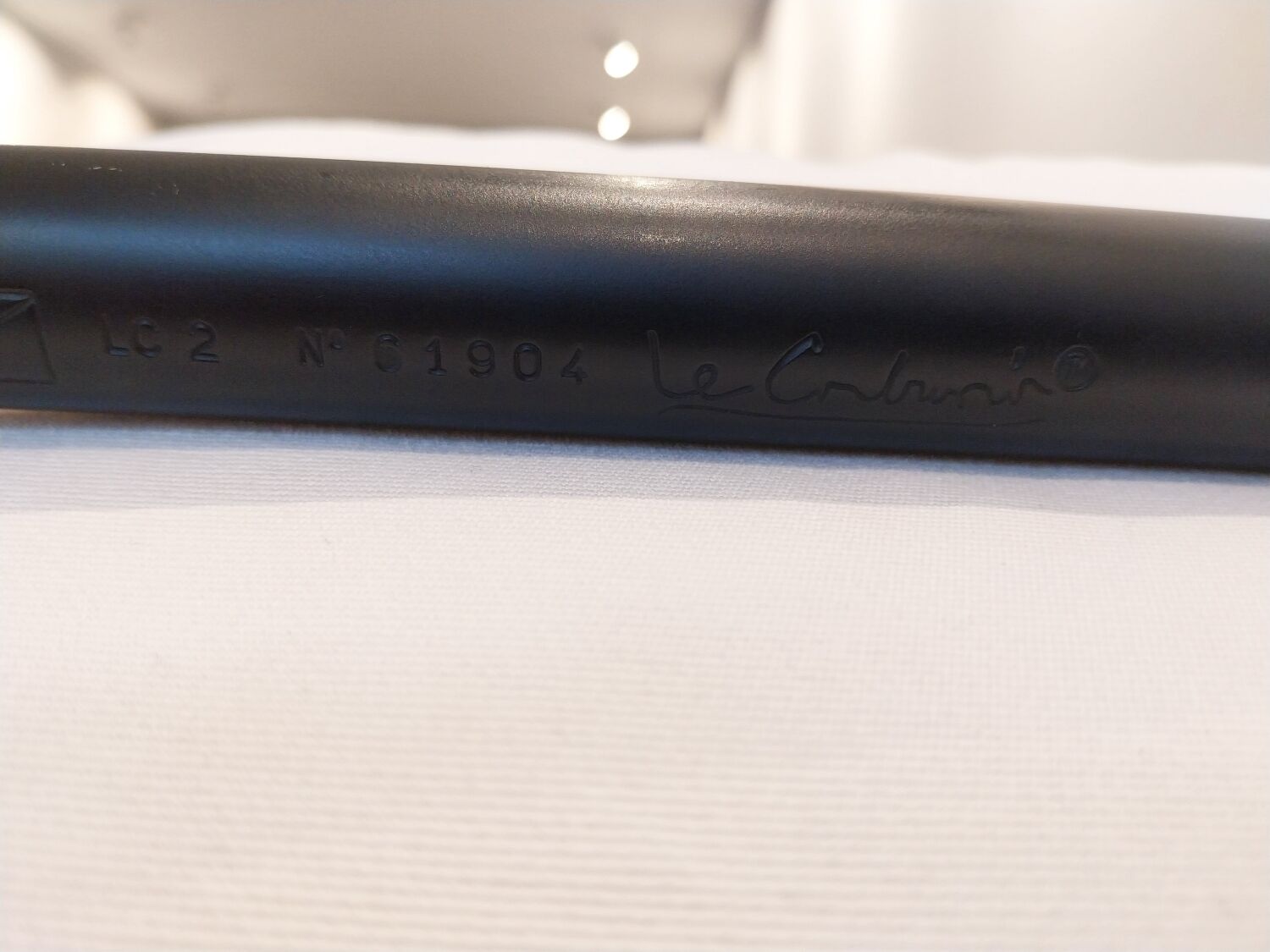 A sofa and two LC2 Cassina armchairs