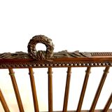 Old Louis XVI style armchair with wide seat
