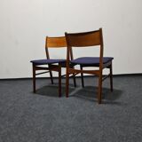 A pair of vintage teak dinning chairs