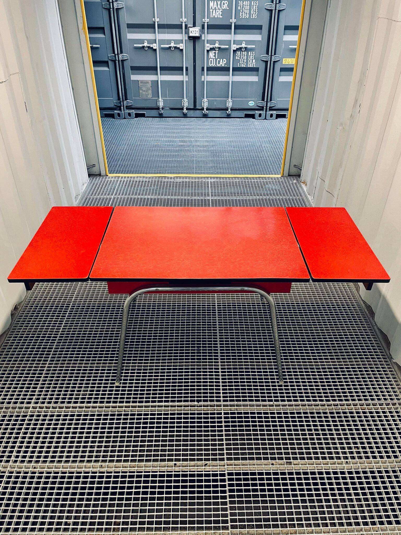 Vintage red formica table from the 60s with extensions