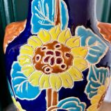Ceramic vase with sunflowers