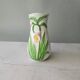Vase in slipware with Arum flowers