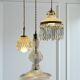 Suspension cascade triple Holophanes and vintage pendants
