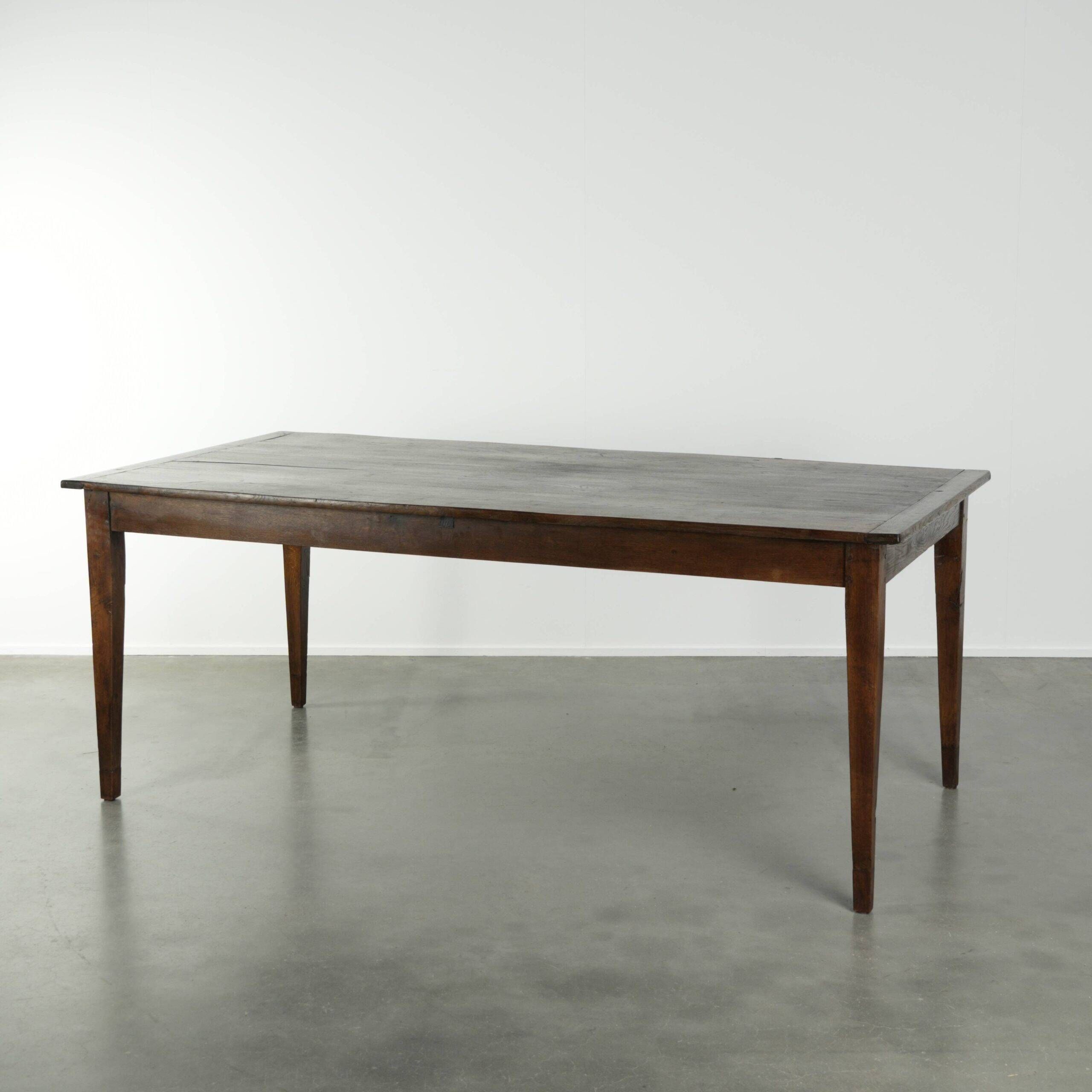 Antique French oak dining table from the early 19th century