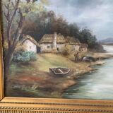 Large painting of a house by the water