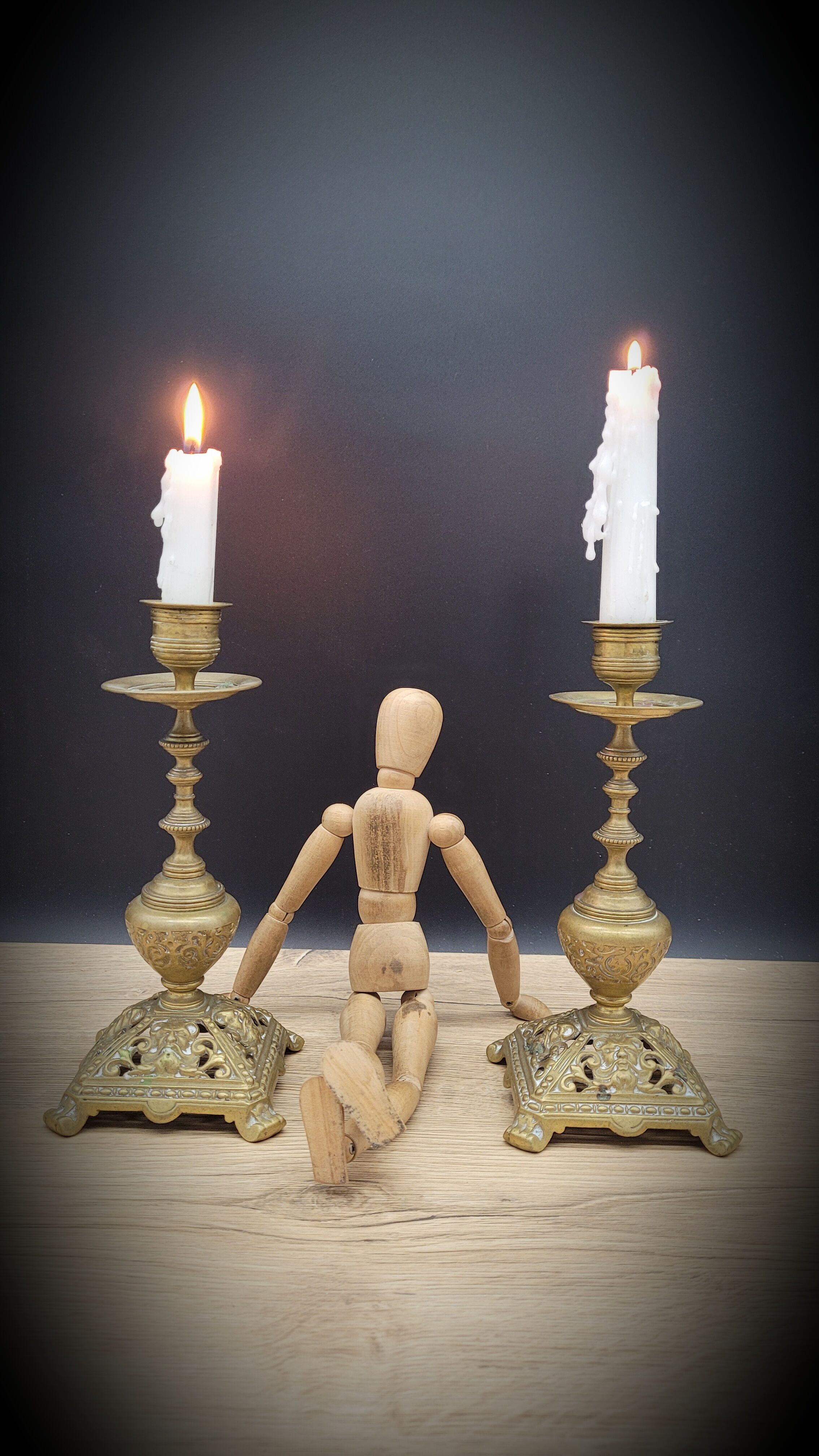 Duo worked brass candle holders