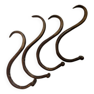 Set of curved wooden coat hooks in Thonet style.