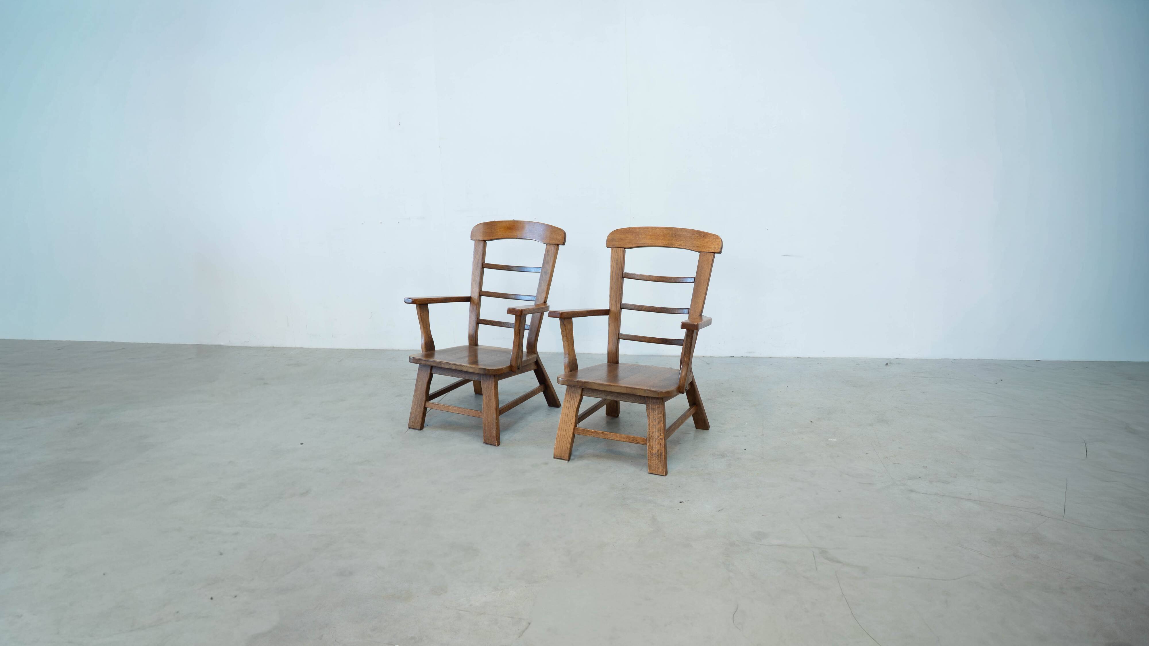 Set of two oak lounge chairs