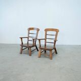 Set of two oak lounge chairs