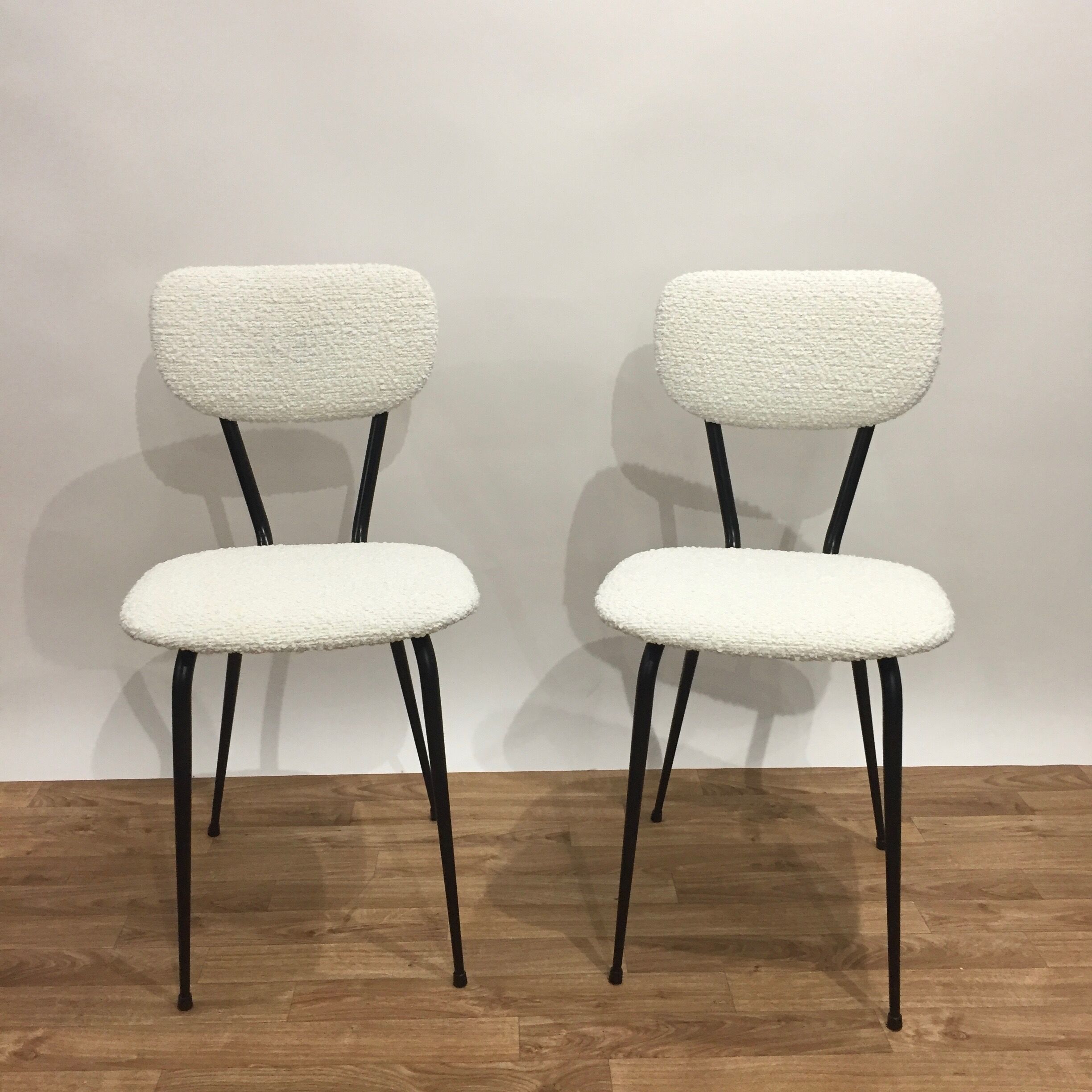 pair of reupholstered chairs loop