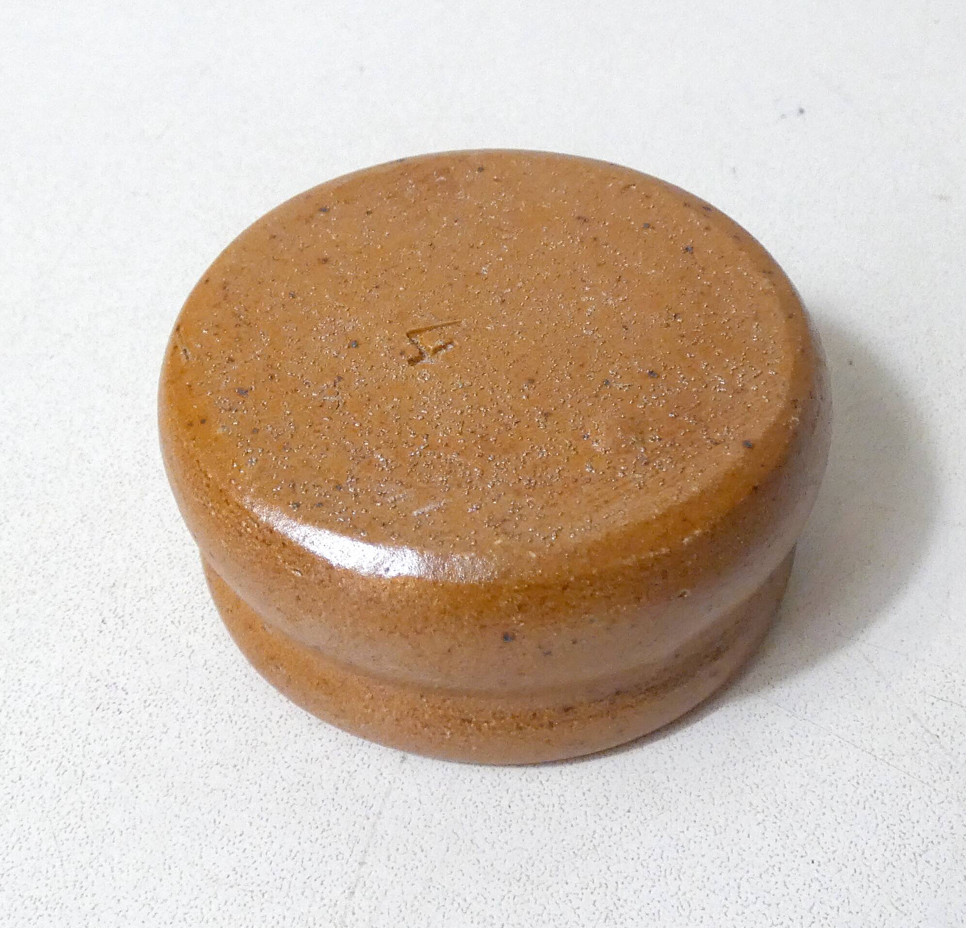 Old small individual butter dish in vintage stoneware