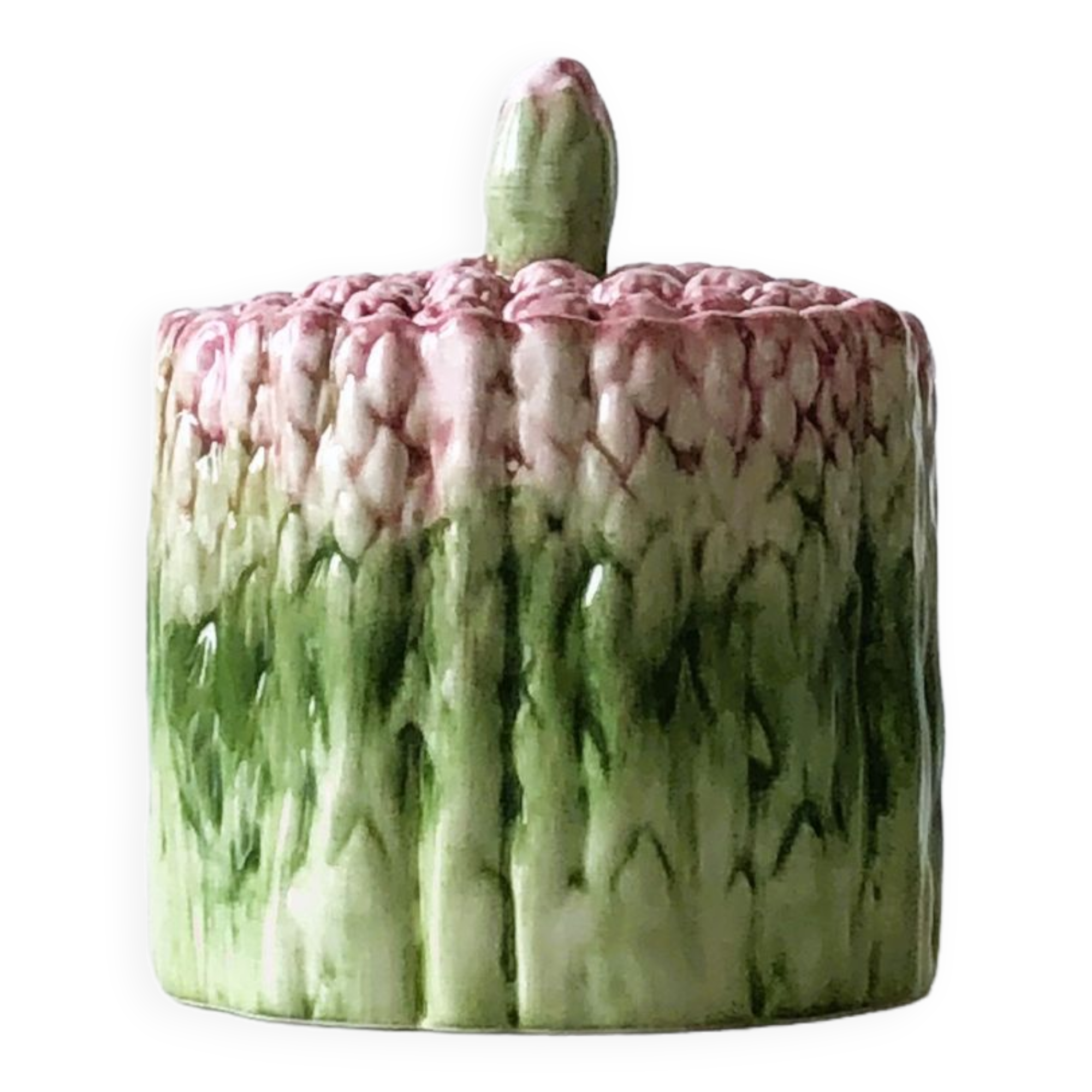 Old mustard pot and its slid in slurry decoration bunch of asparagus.