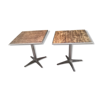 Two vintage bistro tables