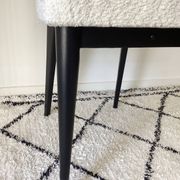 Fully restored vintage chair in boucle fabric.
