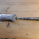 Filled silver pie shovel