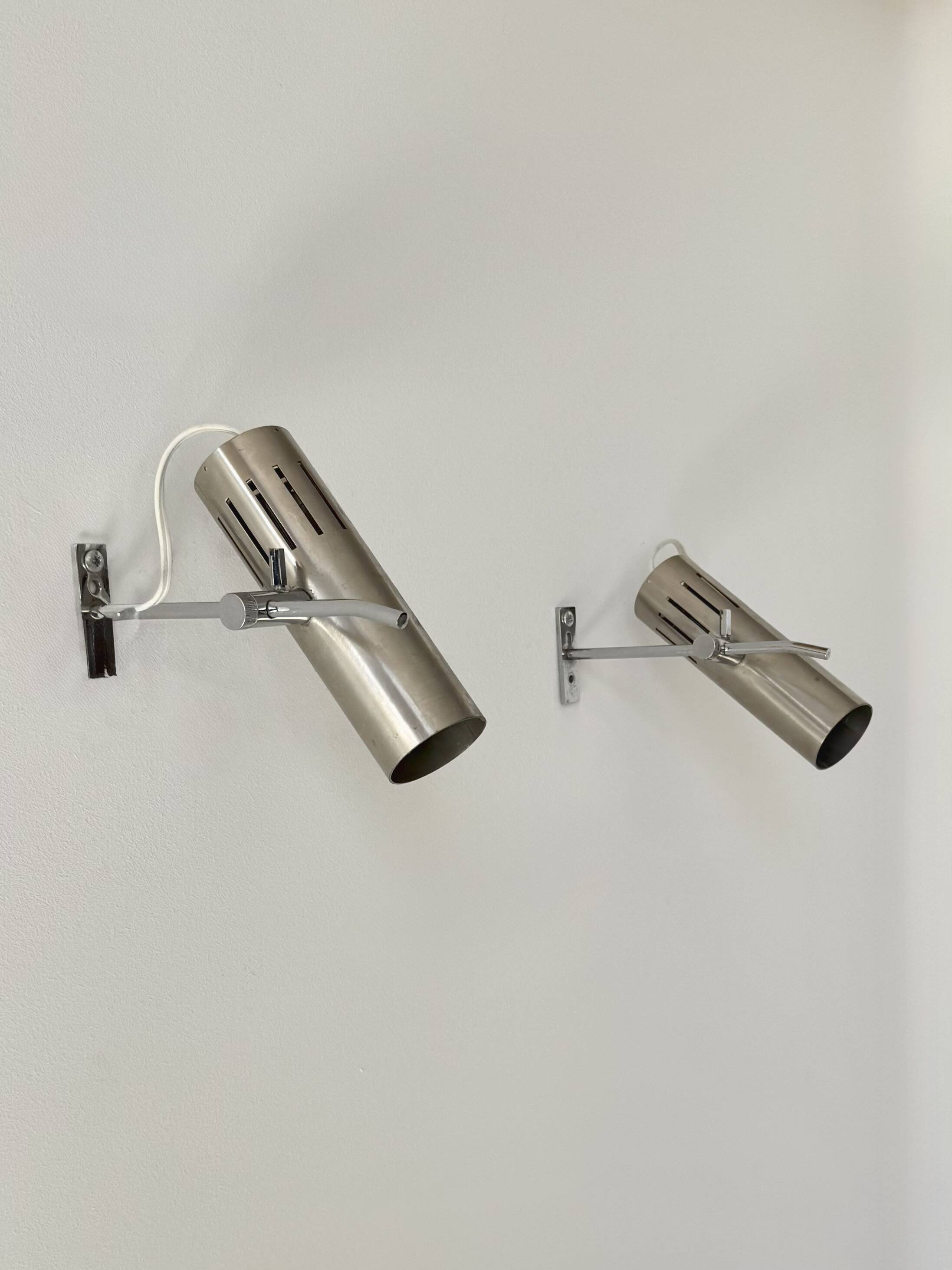 Pair of vintage wall sconces by Alain Richard, metal and aluminium, France.