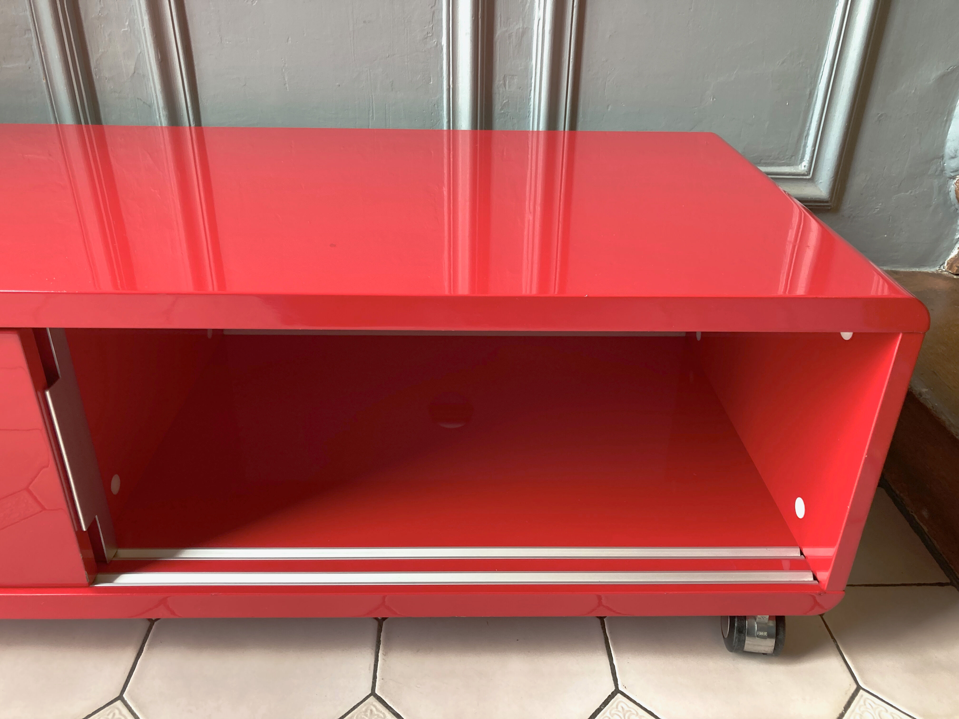 Lacquered red tv cabinet