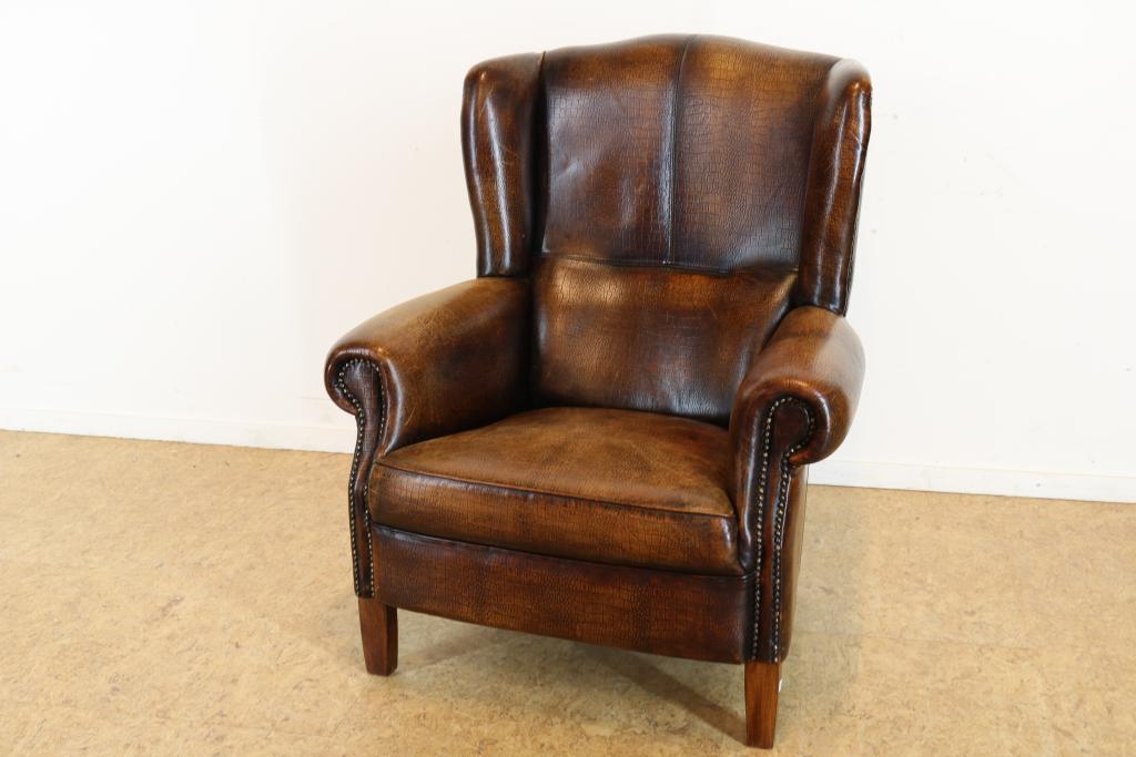 Dark brown leather club chair