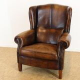Dark brown leather club chair