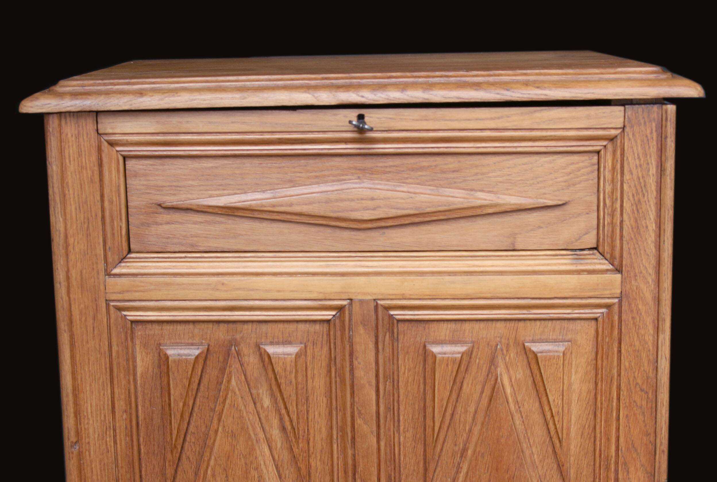 Art Deco jam cupboard in solid oak (circa 1930).