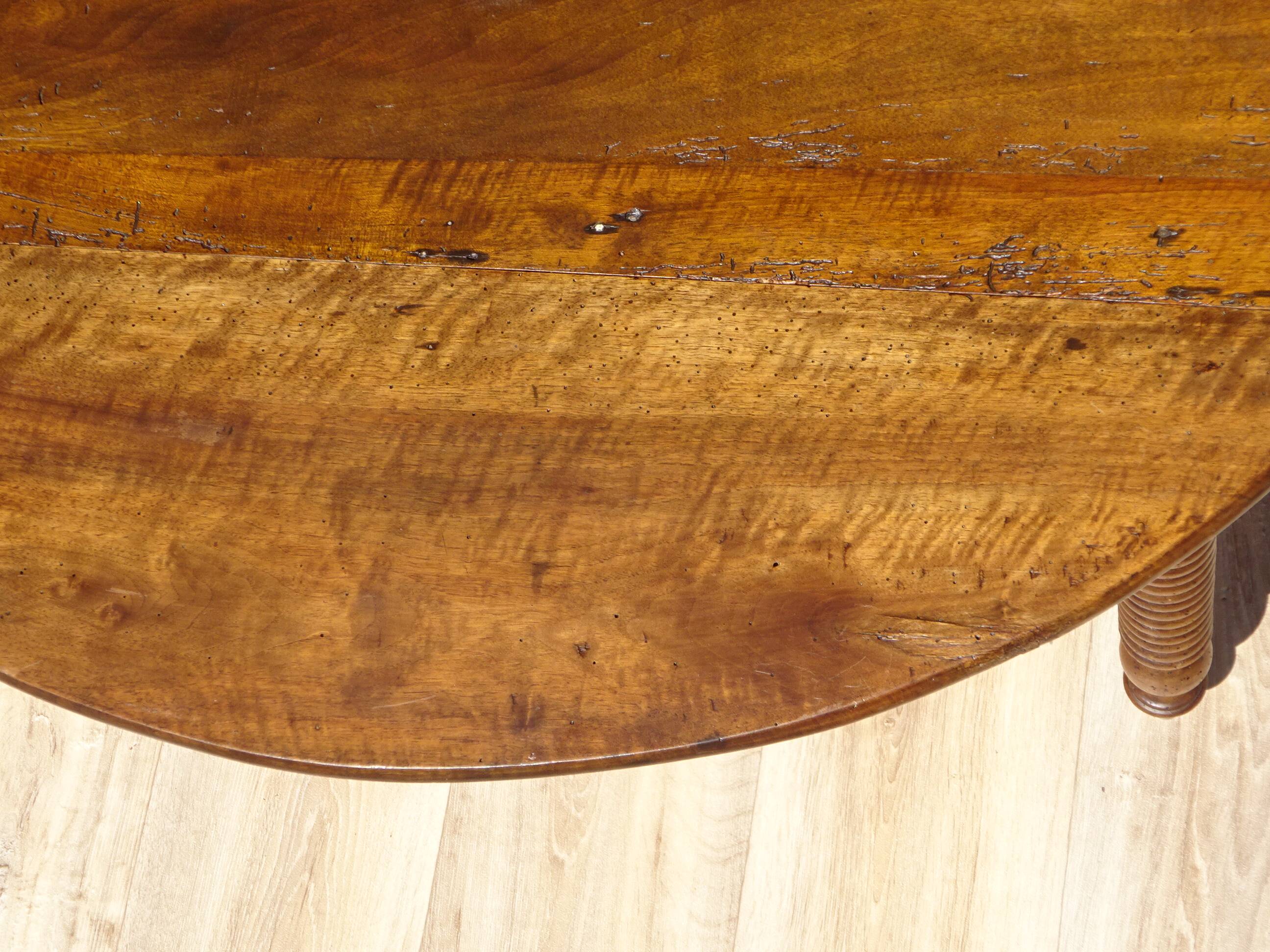 Antique walnut console table with honey spoon legs.