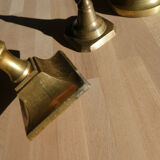 Set of 4 old candle holders in golden brass