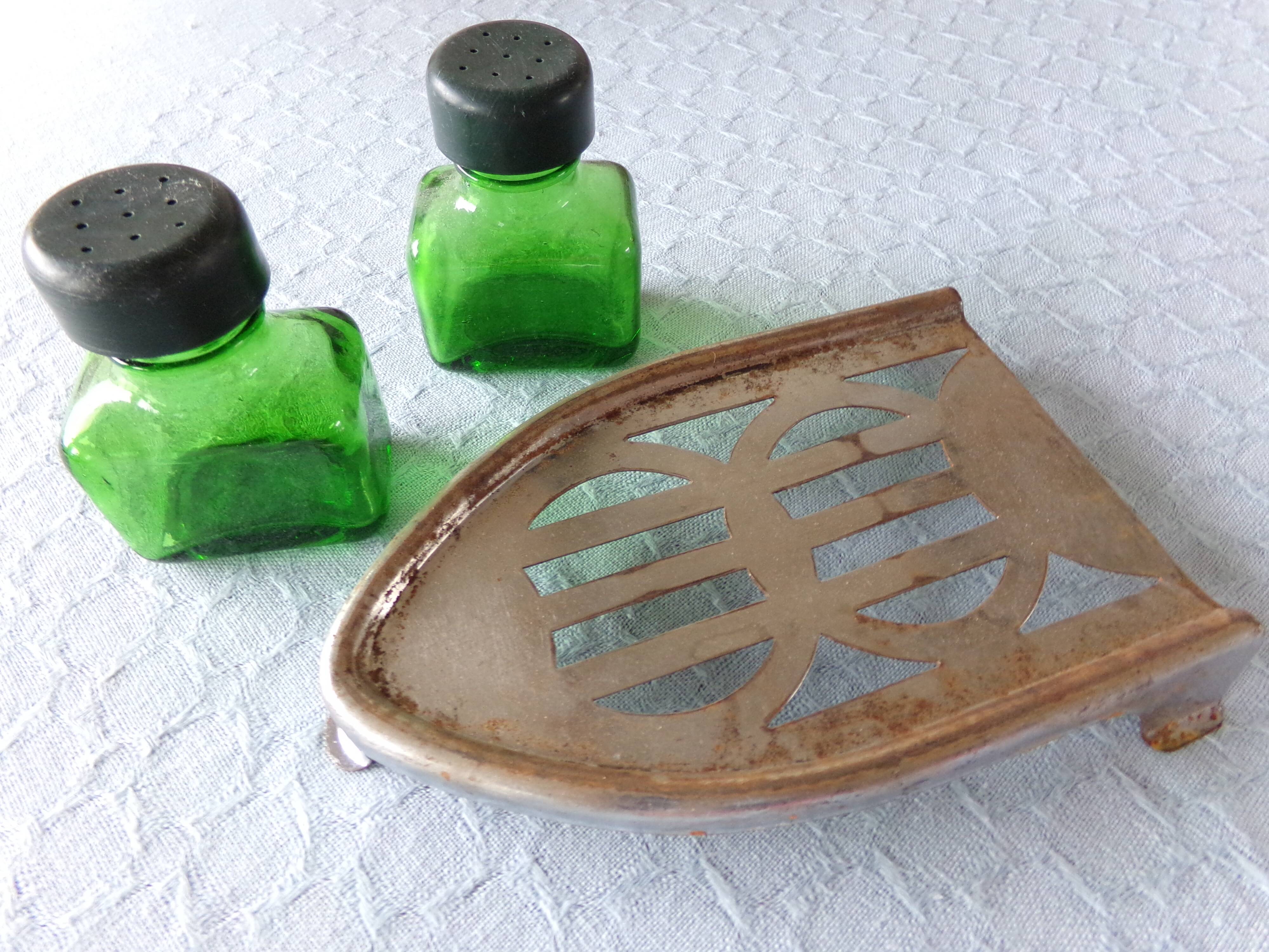 Salt/pepper green glass jars on metal base