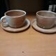 Pair of sandstone cups