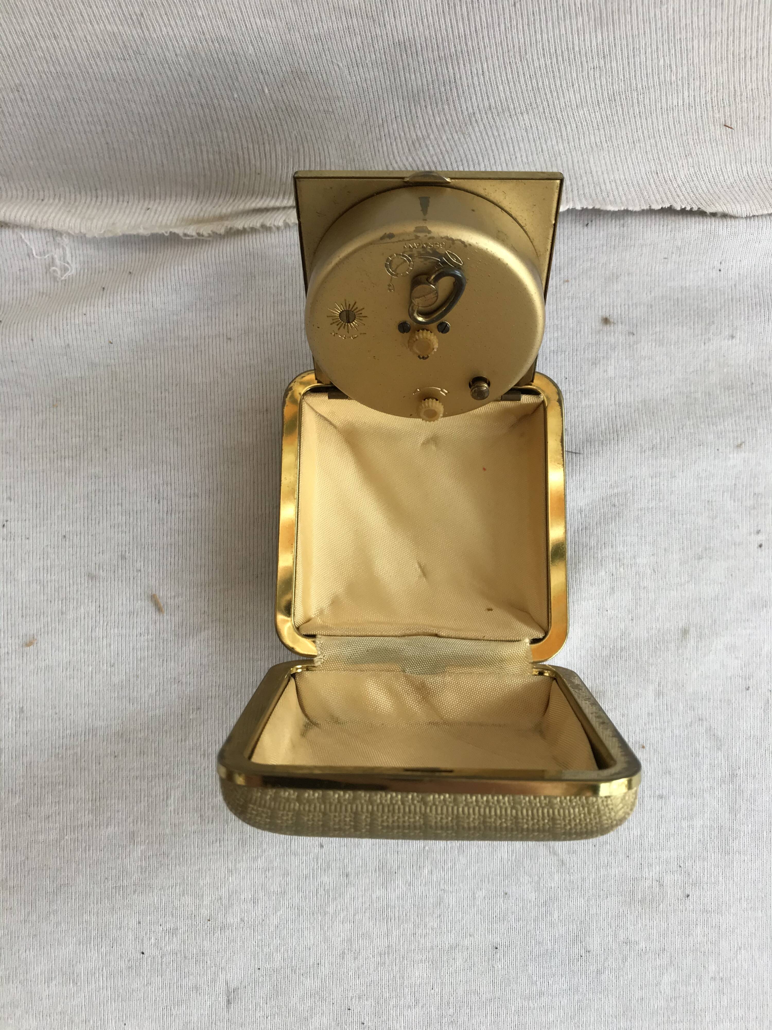 Old europa 2 travel alarm clock with 70's vintage gold case