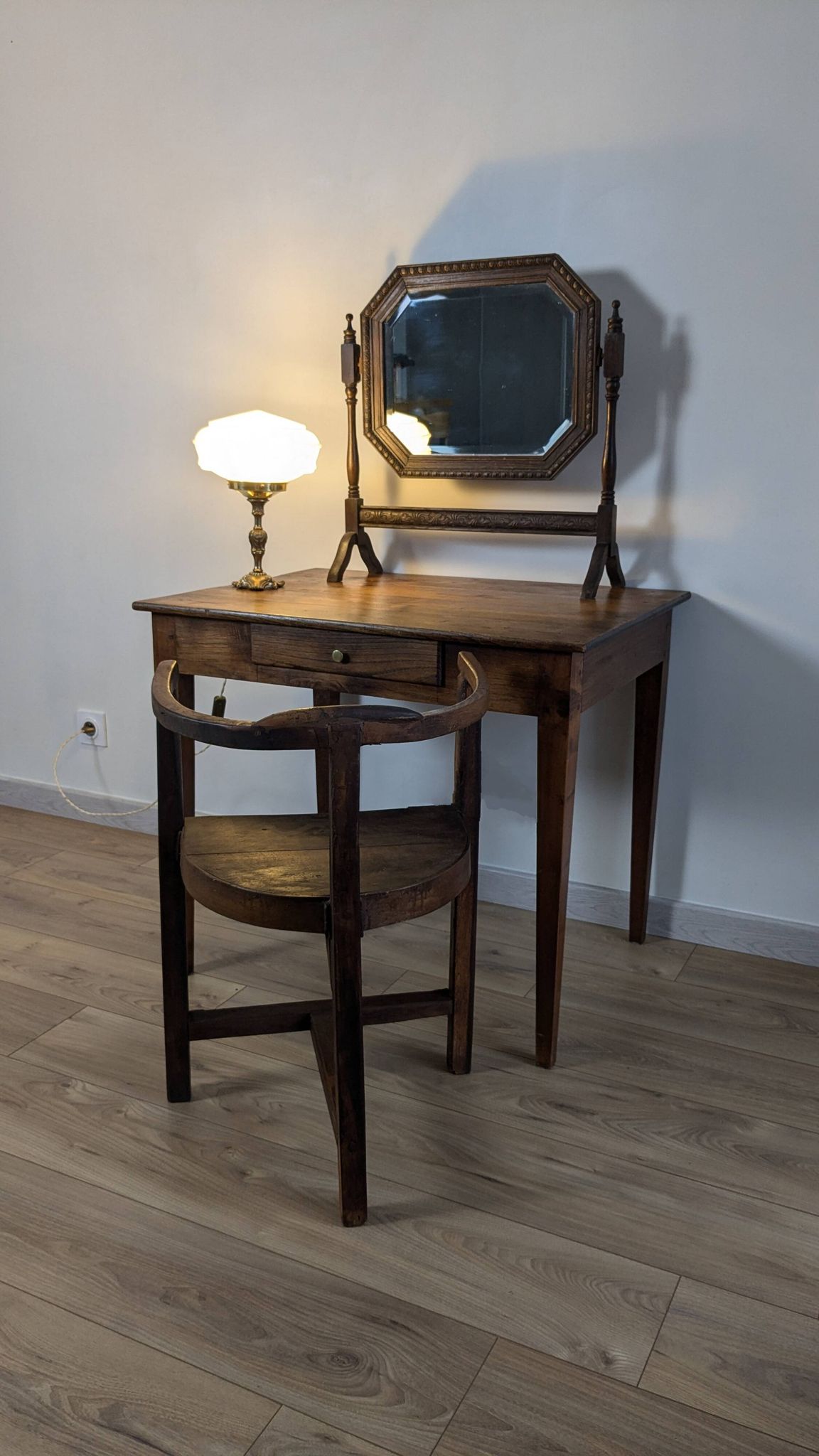 Antique beveled octagonal vanity mirror in carved wood