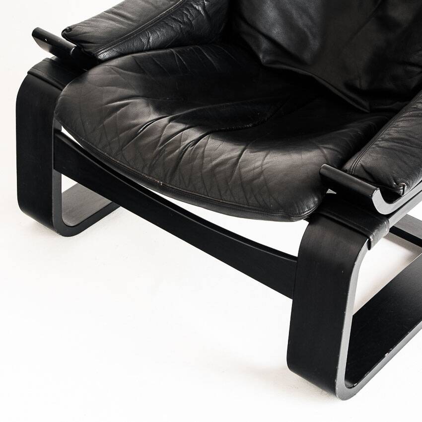 Kroken armchair in curved wood and leather. Design by Ake Fribytter for Nelo. Sweden, 80s