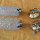 Paire d'appliques en laiton et verre
