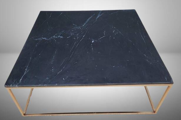 Coffee table or black marble and brass display "in its own juice"