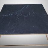 Coffee table or black marble and brass display "in its own juice"