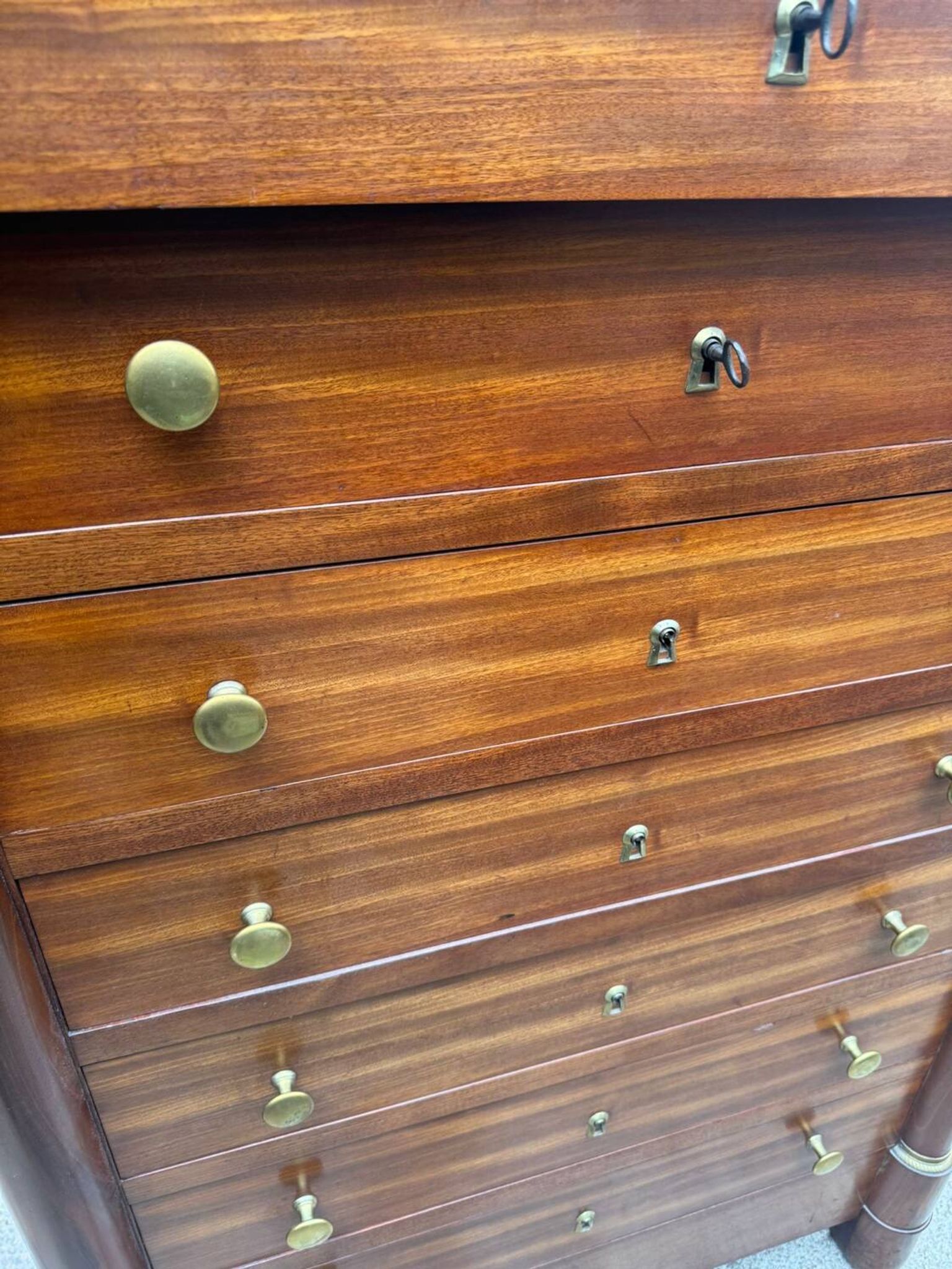 Empire chest of drawers in mahogany and black marble, 19th century