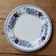 Vintage Gien earthenware flat plate with floral pattern on the border