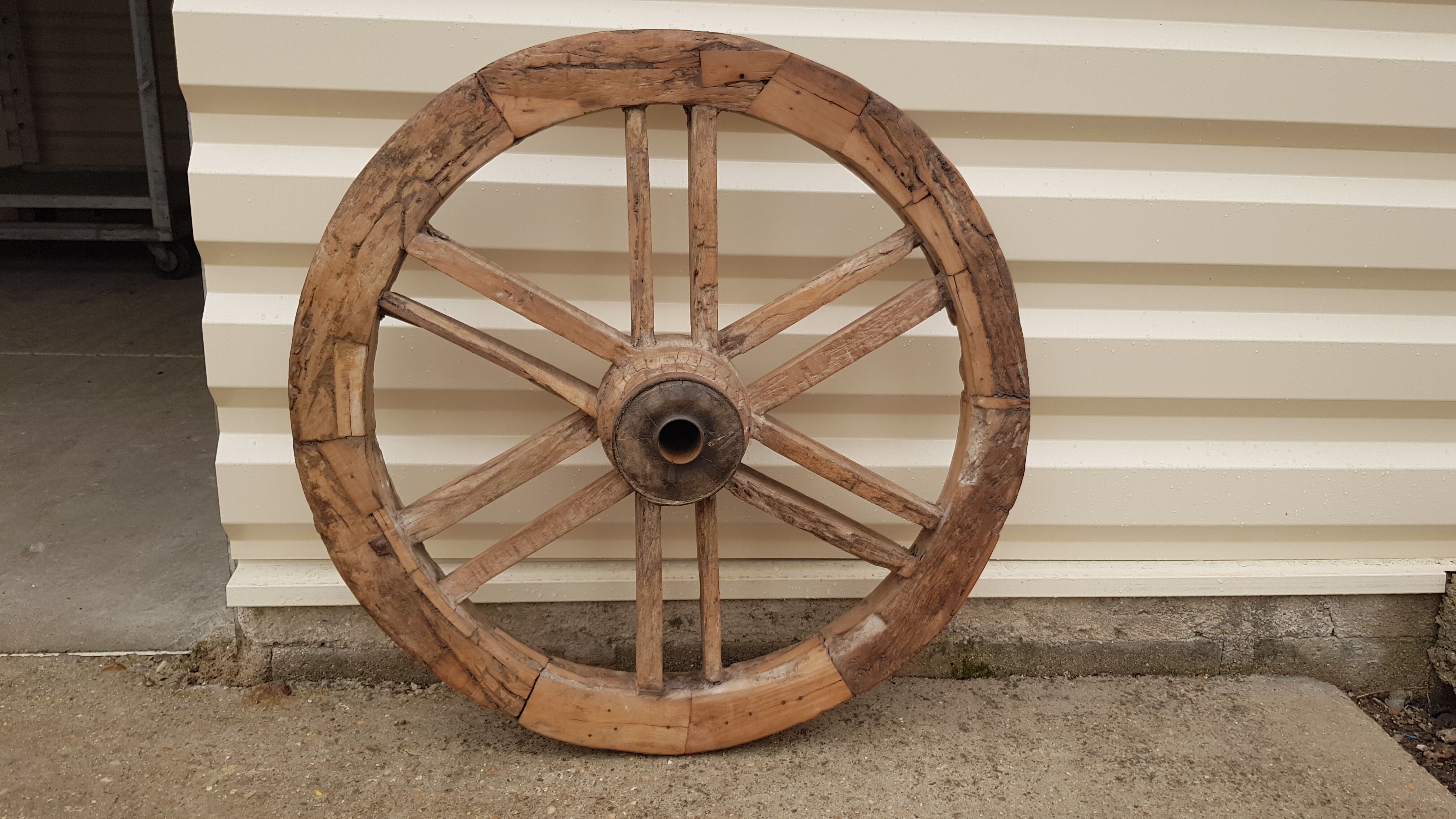 Old teak plow wheel