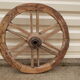 Old teak plow wheel