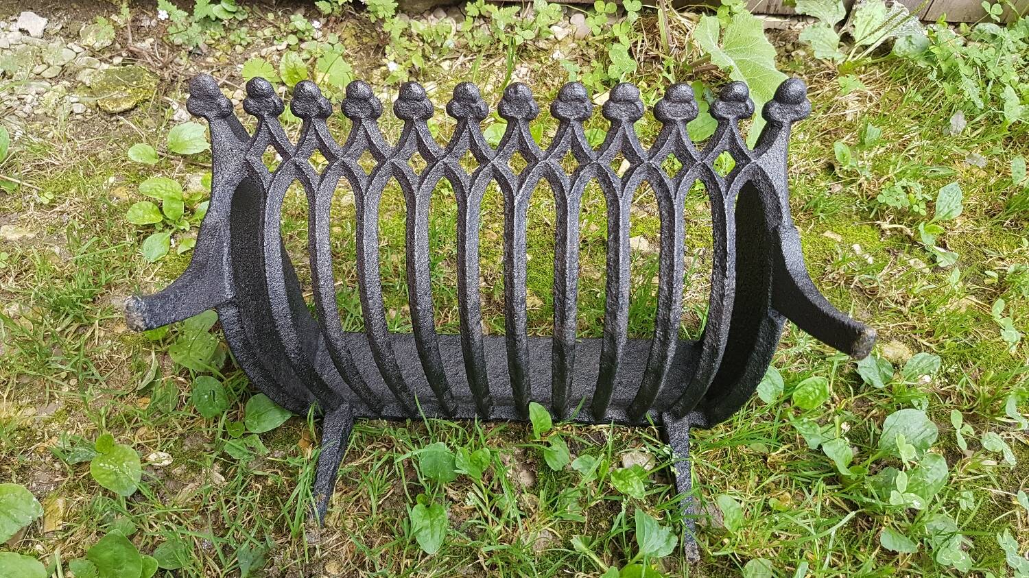 Old vintage black cast iron fireplace