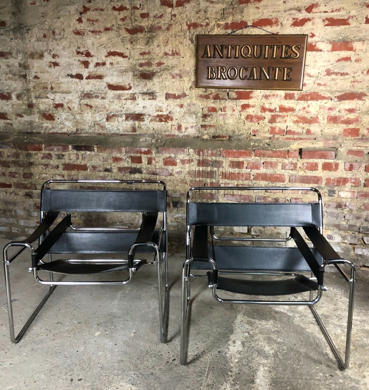 Pair of Marcel Breuer's Wassily armchairs in stainless steel and 60's leather
