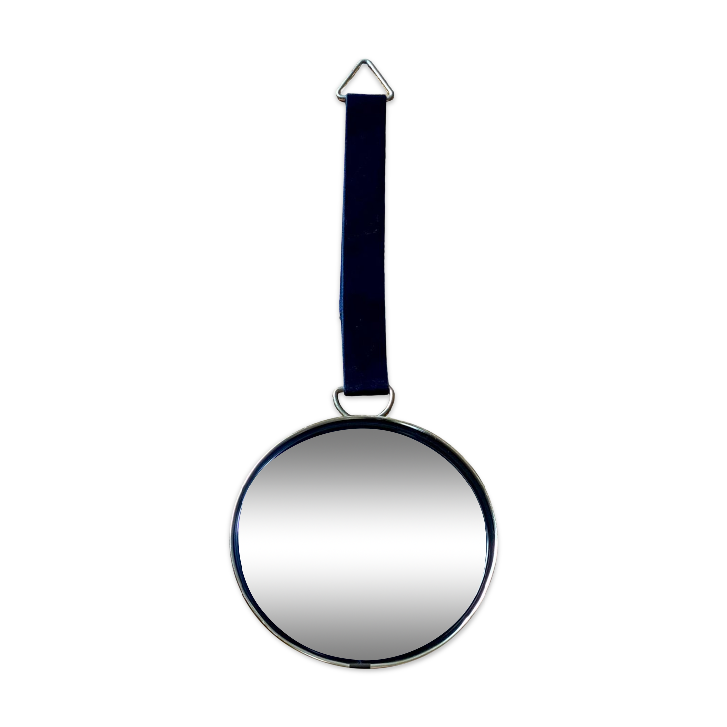 Vintage witch's eye curved mirror hangs velvet ribbon