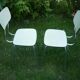 Pair of pale yellow formica chairs