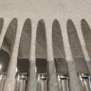 12 silver-plated dessert knives by Platil, rocaille style