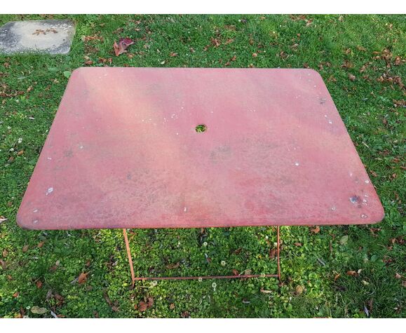 Red folding metal garden table