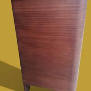 Small veneered wooden Art Deco chest of drawers.