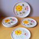 Assiettes à dessert fleuries ,Sarreguemines 1960.
