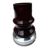 Red glass table lamp on a chrome base.